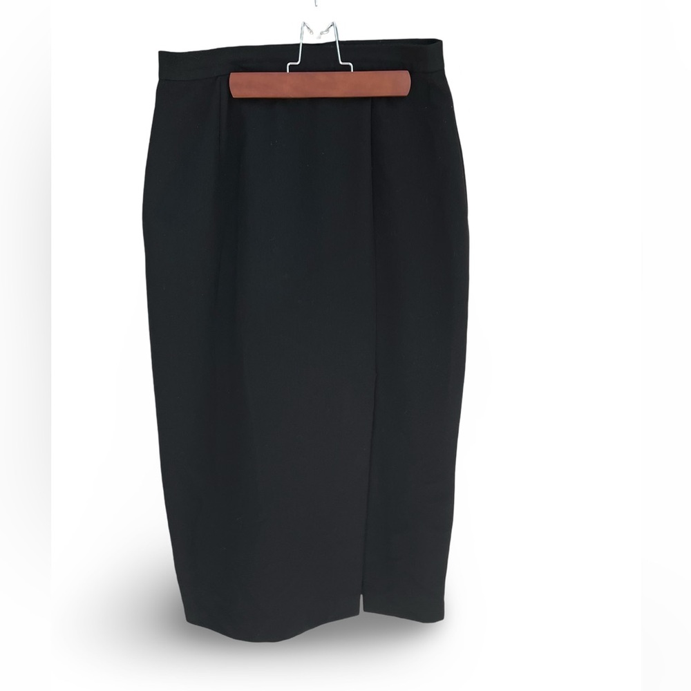 Long black skirt with opening at the bottom - size 12 but fits 8-10